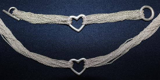 A Tiffany & Co sterling silver multi chain link heart toggle choker necklace and matching bracelet, necklace 15.25in.